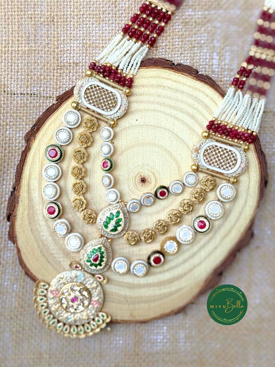 Devyani: Cubic Zirconia Diamonds, Meenakari Artistry and Delicate Pearls