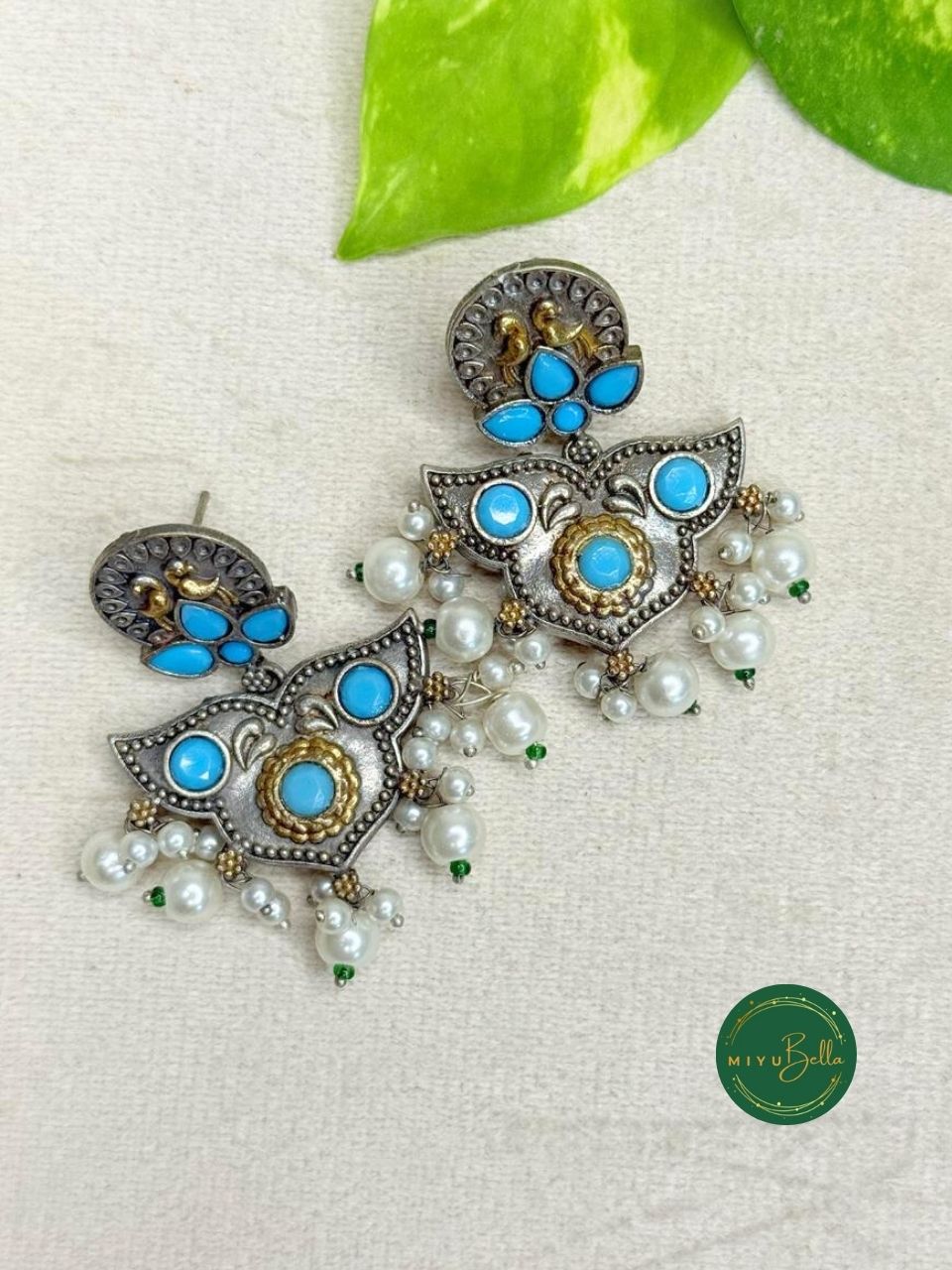 Deepika - Turquoise Blue Floral Motif Dangler Earrings