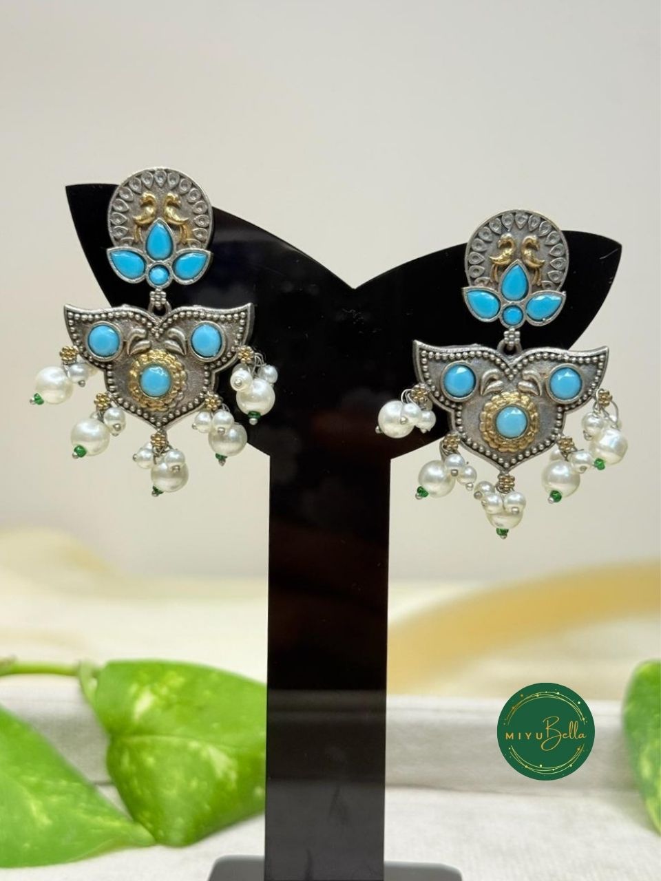 Deepika - Turquoise Blue Floral Motif Dangler Earrings