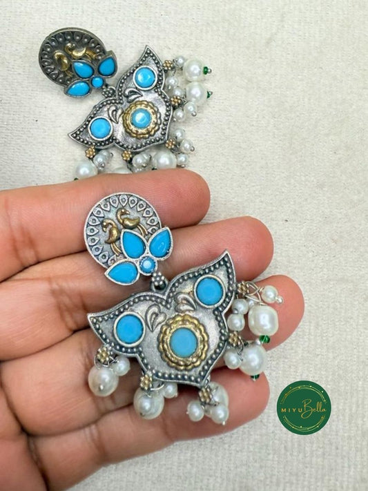Deepika - Turquoise Blue Floral Motif Dangler Earrings