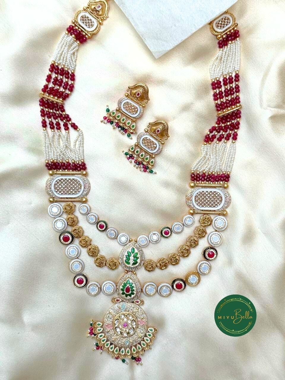 Devyani: Cubic Zirconia Diamonds, Meenakari Artistry and Delicate Pearls